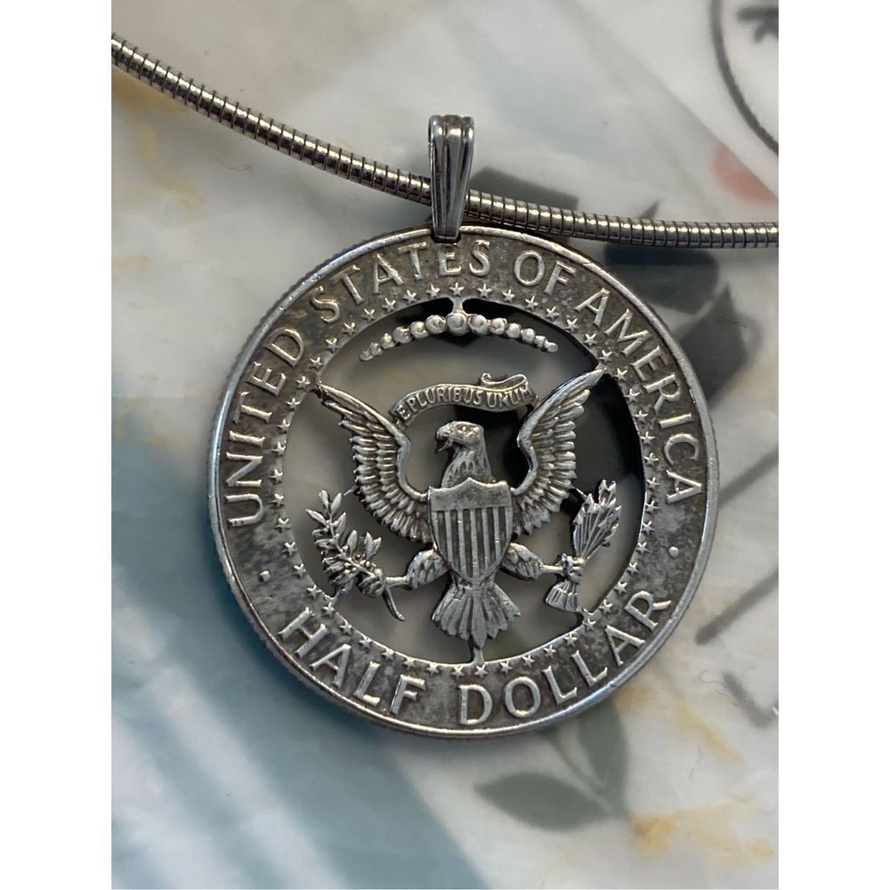 Silver half dollar carved pendant necklace